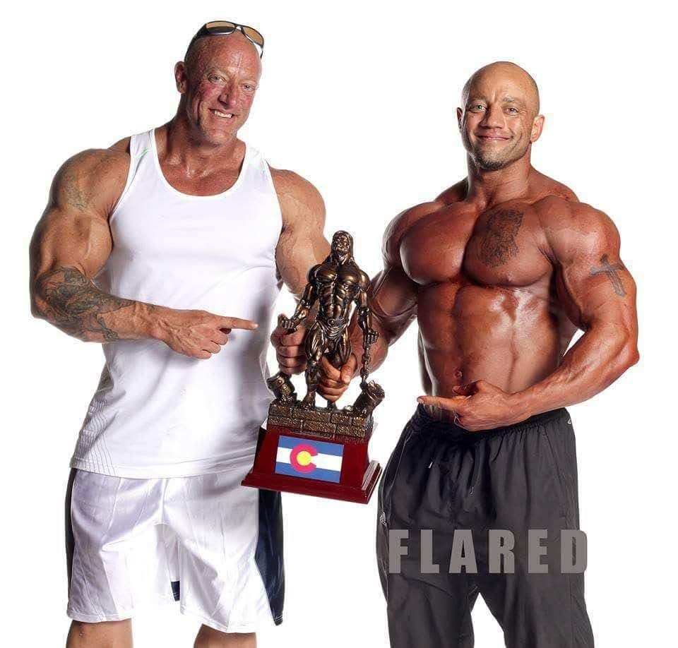 Chris Havekost with a Prodigy client and their Colorado bodybuilding trophy